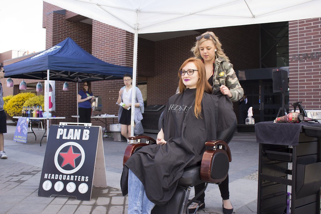 Kelowna Hair Salon - Plan B supports cuts for a cure - Courtney prepping long hair for cut